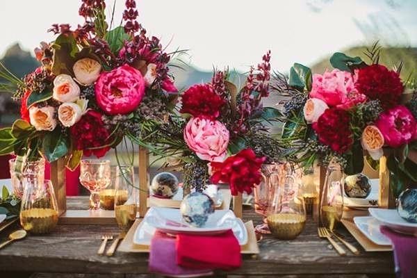 red tableware and flowers for spring wedding color palette