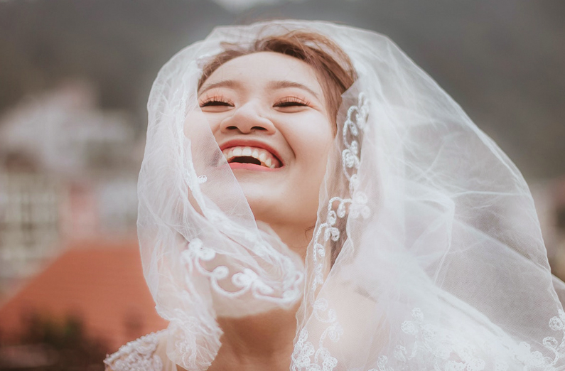 Wedding Makeup - Joyful Bride With Veil