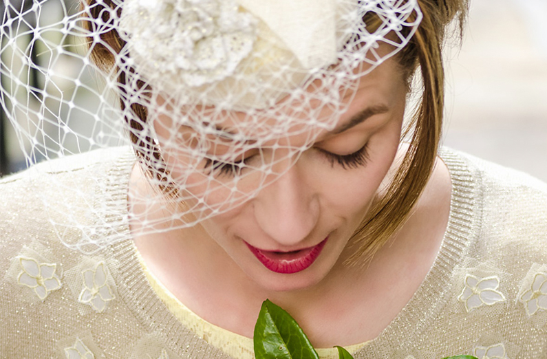 Woman Wearing White Birdcage Veil